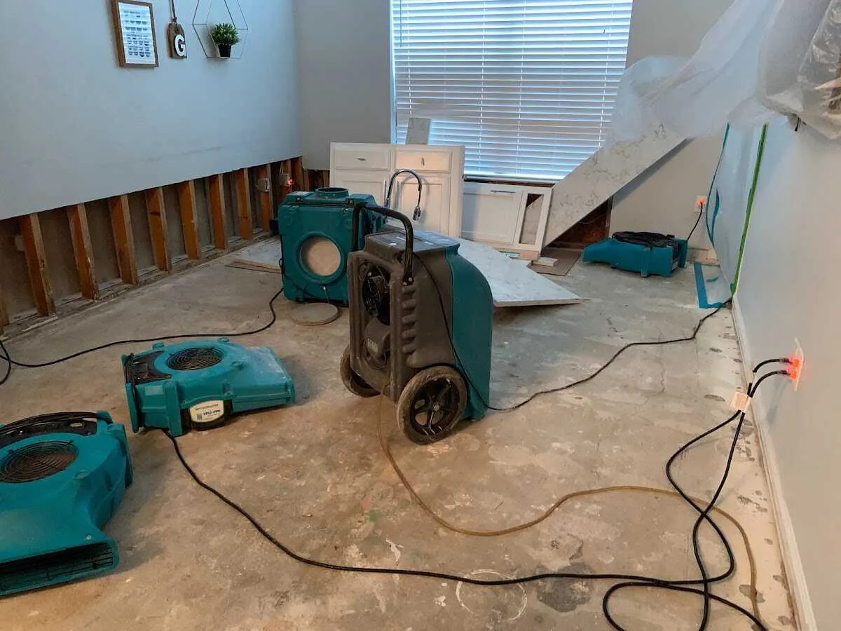 Dehumidifier in flood-cut room for Water Extraction & Removal in Buda